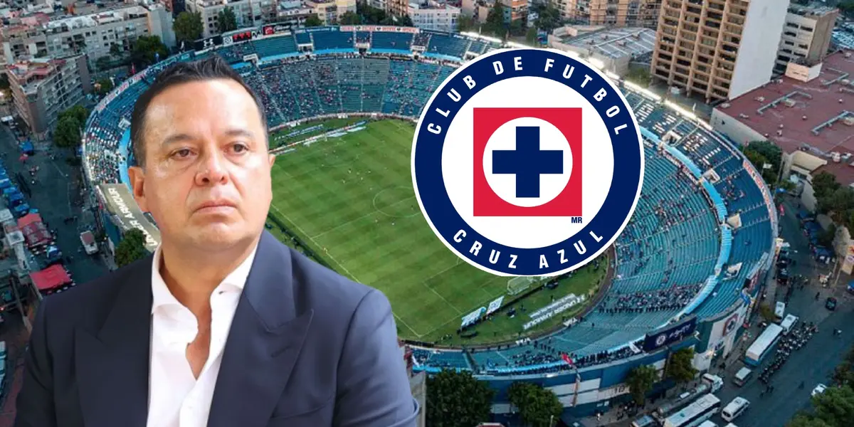 Víctor Velázquez con el escudo de Cruz Azul, de fondo el estadio azul